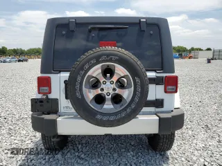 2018 Jeep Wrangler Unlimited Sahara z VIN 1C4BJWEGXJL838339, wystawiony jako Copart lot #54161375 z przebiegiem 70 556 mil mil oraz Szkoda całkowita • Salvage title. Historia ofert i sprzedaży dostępna na DreamBid. Obrazek 6.