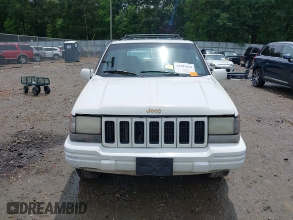 1996 Jeep Grand Cherokee Limited z VIN 1J4GZ78YXTC191527, wystawiony jako IAAI lot #42352616 z przebiegiem 325 927 mil mil oraz . Historia ofert i sprzedaży dostępna na DreamBid. Obrazek 13.