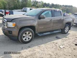 2016 GMC Canyon 4WD SLE z VIN 1GTG6CE38G1385863, wystawiony jako Copart lot #54009685 z przebiegiem 80 666 mil mil oraz Szkody całkowita. Historia ofert i sprzedaży dostępna na DreamBid. Obrazek 1.