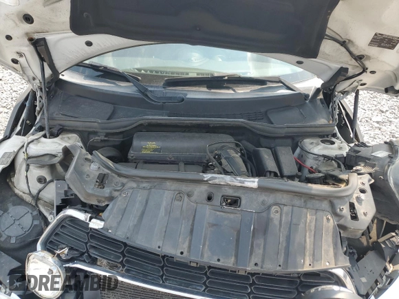 2015 MINI Countryman S with VIN WMWZC3C55FWT03267, listed as a Copart auction lot 59331605 with 116,964 mi miles and Salvage title. Bid and sale history available at DreamBid. Image 11.