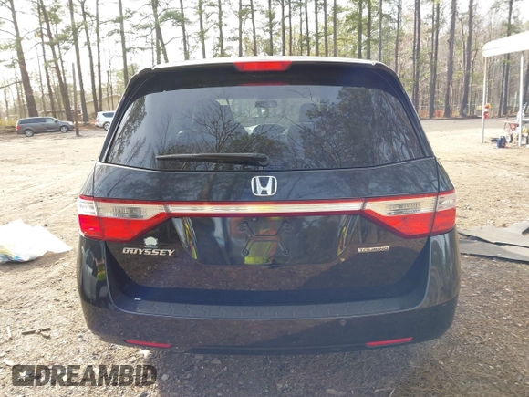 2013 Honda Odyssey Touring with VIN 5FNRL5H96DB003796, listed as a IAAI auction lot 41828376 with 6,308 mi miles and . Bid and sale history available at carsss.com. Image 16.