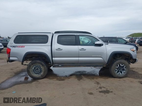 2017 Toyota Tacoma SR5 with VIN 3TMCZ5AN8HM051829, listed as a IAAI auction lot 41616329 with 64,113 mi miles and . Bid and sale history available at DreamBid. Image 13.