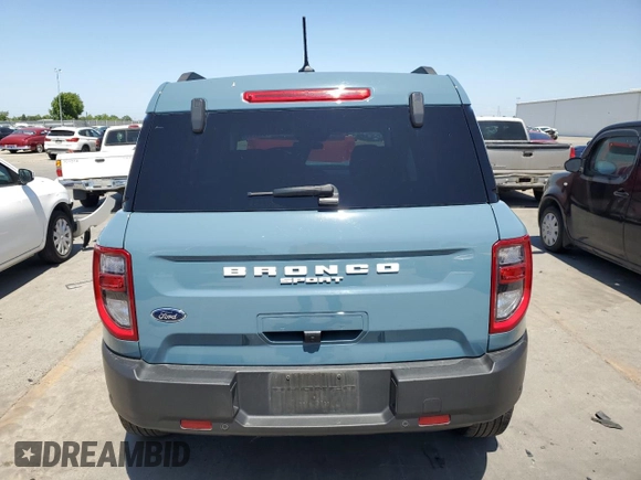 2023 Ford Bronco Sport Big Bend with VIN 3FMCR9B69PRD42089, listed as a Copart auction lot 54880595 with 34,984 mi miles and Salvage title. Bid and sale history available at DreamBid. Image 6.