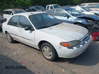 1997 Ford Escort LX with VIN 1FALP13P4VW278594, listed as a IAAI auction lot 42125007 with 290,855 mi miles. Bid and sale history available at carsss.com. Image 1.