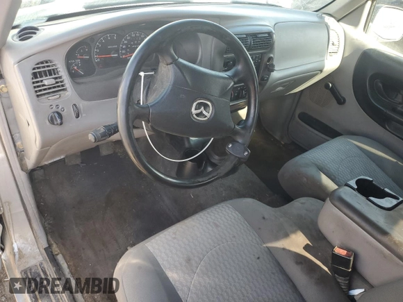 2003 Mazda B-Series Truck DS z VIN 4F4YR16U13TM01916, wystawiony jako Copart lot #53642875 z przebiegiem 86 309 mil mil oraz Szkoda całkowita • Salvage title. Historia ofert i sprzedaży dostępna na DreamBid. Obrazek 8.