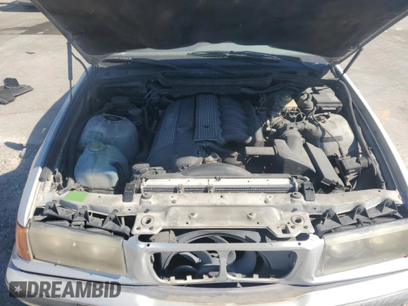 1998 BMW 3 Series 328iA with VIN WBACD4326WAV64466, listed as a Copart auction lot 74957534 with 152,963 mi miles and Salvage Title. Bid and sale history available at carsss.com. Image 11.