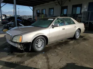 2004 Cadillac DeVille DHS z VIN 1G6KE57Y74U260609, wystawiony jako Copart lot #86567844 z przebiegiem 189 600 mil mil oraz Szkoda całkowita • Salvage title. Historia ofert i sprzedaży dostępna na DreamBid. Obrazek 1.