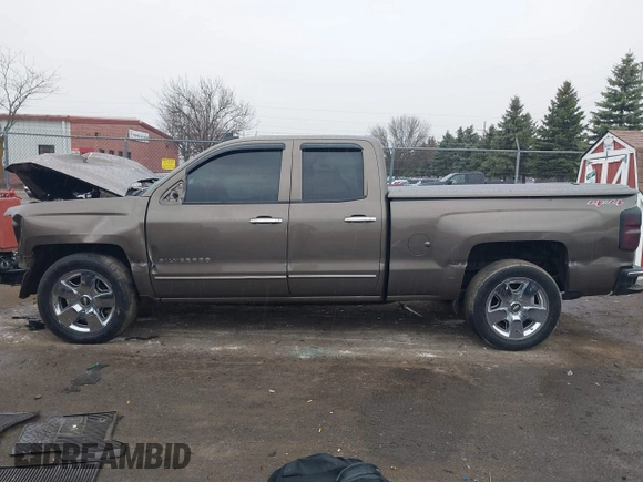 2015 Chevrolet Silverado 1500 LT with VIN 1GCVKREC9FZ237338, listed as a IAAI auction lot 41897225 with 154,229 mi miles and . Bid and sale history available at DreamBid. Image 14.