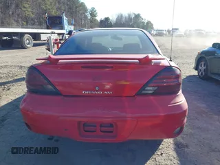 2004 Pontiac Grand Am SE1 with VIN 1G2NF52E84C102696, listed as a IAAI auction lot 41363904 with 217,905 mi miles. Bid and sale history available at carsss.com. Image 16.