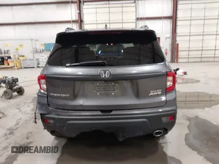 2019 Honda Passport Touring with VIN 5FNYF8H98KB007933, listed as a IAAI auction lot 41953263 with 87,614 mi miles and . Bid and sale history available at DreamBid. Image 16.