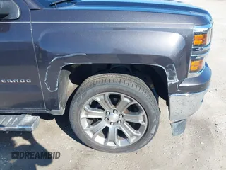 2014 Chevrolet Silverado 1500 LT with VIN 1GCVKREC0EZ377177, listed as a IAAI auction lot 41683600 with 148,672 mi miles and . Bid and sale history available at DreamBid. Image 17.