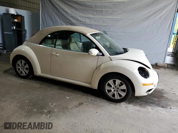 2009 Volkswagen Beetle S with VIN 3VWRG31Y39M402031, listed as a Copart auction lot 57285455 with 101,220 mi miles and Salvage title. Bid and sale history available at DreamBid. Image 4.