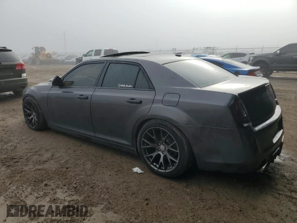 2013 Chrysler 300 with VIN 2C3CCAKT8DH712473, listed as a Copart auction lot 85311994 with 173,640 mi miles and Salvage Title. Bid and sale history available at carsss.com. Image 2.