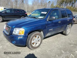 2004 GMC Envoy SLE with VIN 1GKDT13S742411275, listed as a Copart auction lot 45196985 with 205,279 mi miles and Salvage Title. Bid and sale history available at carsss.com. Image 1.