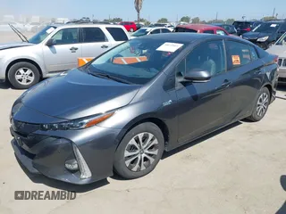 2021 Toyota Prius LE with VIN JTDKAMFP3M3167586, listed as a IAAI auction lot 39672661 with 42,050 mi miles and . Bid and sale history available at DreamBid. Image 2.