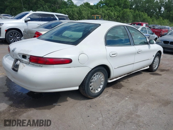 1999 Mercury Sable LS Premium Group with VIN 1MEFM53S3XG637697, listed as a IAAI auction lot 42283365 with 187,758 mi miles and . Bid and sale history available at DreamBid. Image 4.