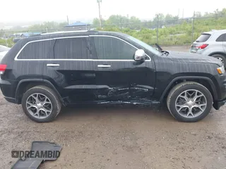 2019 Jeep Grand Cherokee Limited z VIN 1C4RJFBG7KC609265, wystawiony jako IAAI lot #42354587 z przebiegiem 105 986 mil mil oraz . Historia ofert i sprzedaży dostępna na DreamBid. Obrazek 13.