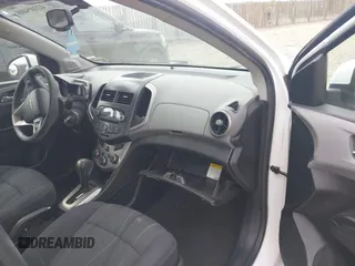 2014 Chevrolet Sonic LT with VIN 1G1JC5SH2E4162166, listed as a IAAI auction lot 42105408 with 122,854 mi miles and . Bid and sale history available at DreamBid. Image 5.
