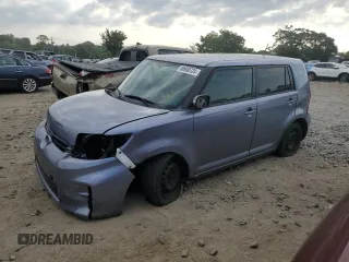 2012 Scion xB z VIN JTLZE4FE0C1143441, wystawiony jako Copart lot #53255765 z przebiegiem 123 585 mil mil oraz Nie do naprawy • Non repairable. Historia ofert i sprzedaży dostępna na DreamBid. Obrazek 1.