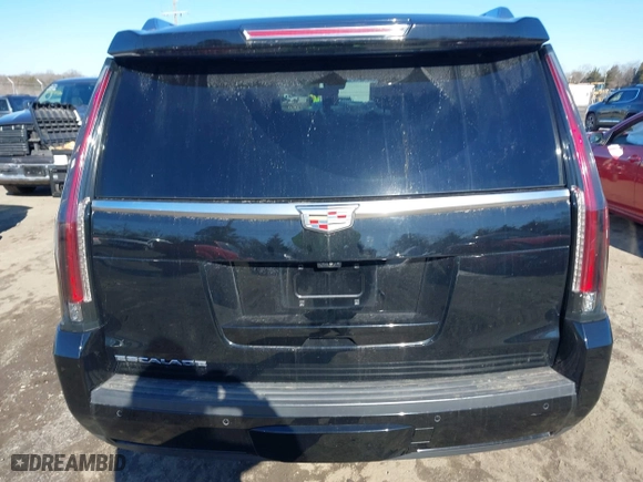 2019 Cadillac Escalade Premium Luxury with VIN 1GYS4CKJ0KR125240, listed as a IAAI auction lot 41568885 with 60,000 mi miles. Bid and sale history available at carsss.com. Image 16.