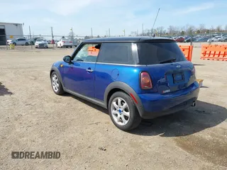 2008 MINI Hardtop with VIN WMWMF33528TT61214, listed as a IAAI auction lot 42054321 with 126,006 mi miles and . Bid and sale history available at DreamBid. Image 3.