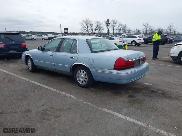 2003 Mercury Grand Marquis LS Premium with VIN 2MEFM75W93X631631, listed as a IAAI auction lot 41726786 with 126,414 mi miles. Bid and sale history available at carsss.com. Image 3.