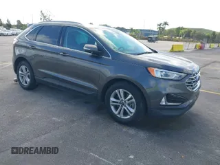 2020 Ford Edge SEL with VIN 2FMPK4J90LBA60985, listed as a IAAI auction lot 41590512 with 141,733 mi miles. Bid and sale history available at carsss.com. Image 1.