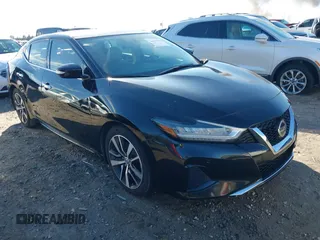 2019 Nissan Maxima Platinum z VIN 1N4AA6AV0KC379524, wystawiony jako IAAI lot #40862758 z przebiegiem 74 145 mil mil oraz . Historia ofert i sprzedaży dostępna na DreamBid. Obrazek 1.