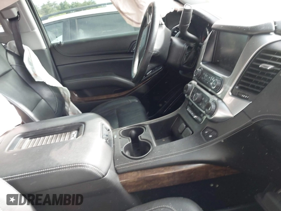 2016 Chevrolet Tahoe LT z VIN 1GNSKBKC7GR331631, wystawiony jako IAAI lot #42300624 z przebiegiem 73 126 mil mil oraz . Historia ofert i sprzedaży dostępna na DreamBid. Obrazek 5.