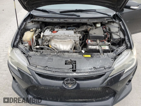 2014 Scion tC z VIN JTKJF5C72E3066945, wystawiony jako Copart lot #56125905 z przebiegiem Nie podano mil oraz Szkoda całkowita • Salvage title. Historia ofert i sprzedaży dostępna na DreamBid. Obrazek 11.