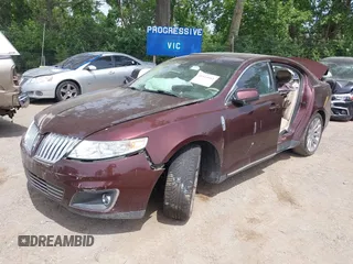 2012 Lincoln MKS with VIN 1LNHL9DRXCG802389, listed as a IAAI auction lot 39543911 with 97,957 mi miles. Bid and sale history available at carsss.com. Image 2.