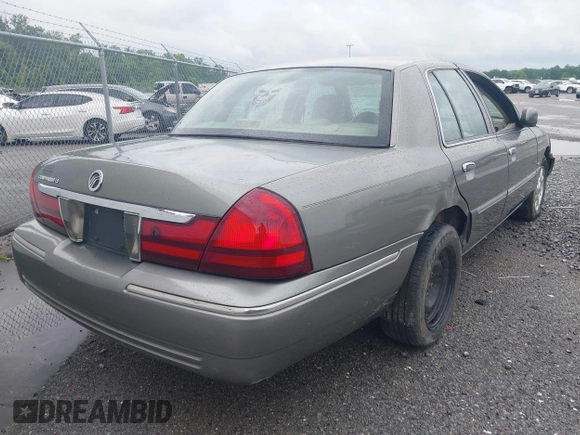 2004 Mercury Grand Marquis LS Premium z VIN 2MEHM75W64X654827, wystawiony jako IAAI lot #41890046 z przebiegiem Nie podano mil oraz . Historia ofert i sprzedaży dostępna na DreamBid. Obrazek 4.