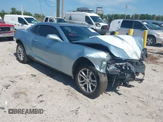 2015 Chevrolet Camaro LS z VIN 2G1FB1E30F9286632, wystawiony jako IAAI lot #41933048 z przebiegiem 164 493 mil mil oraz . Historia ofert i sprzedaży dostępna na DreamBid. Obrazek 1.