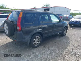 2004 Honda CR-V EX z VIN JHLRD788X4C054489, wystawiony jako IAAI lot #42320647 z przebiegiem 207 129 mil mil oraz . Historia ofert i sprzedaży dostępna na DreamBid. Obrazek 4.