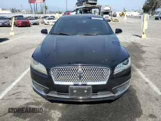 2018 Lincoln MKZ Hybrid Reserve z VIN 3LN6L5MU2JR621992, wystawiony jako Copart lot #58600025 z przebiegiem 136 672 mil mil oraz Szkoda całkowita • Salvage title. Historia ofert i sprzedaży dostępna na DreamBid. Obrazek 5.