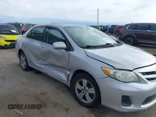 2011 Toyota Corolla L with VIN 2T1BU4EEXBC571707, listed as a IAAI auction lot 41884755 with 200,210 mi miles. Bid and sale history available at carsss.com. Image 6.