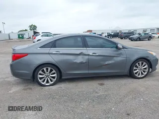 2013 Kia Optima EX with VIN 5XXGN4A75DG148460, listed as a IAAI auction lot 42414837 with 163,999 mi miles and . Bid and sale history available at DreamBid. Image 6.