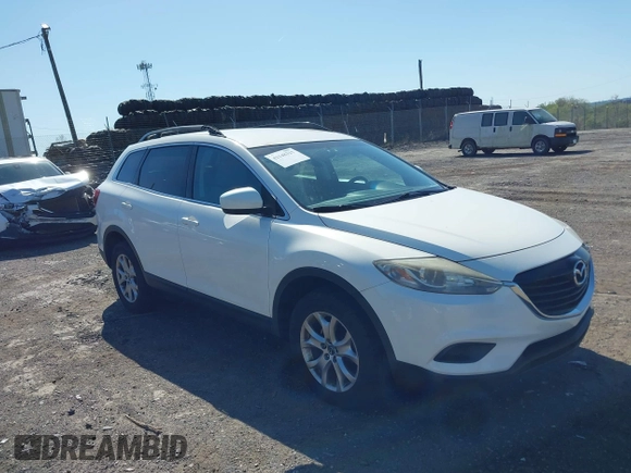 2015 Mazda CX-9 Touring with VIN JM3TB3CV1F0461403, listed as a IAAI auction lot 42148325 with 143,452 mi miles. Bid and sale history available at carsss.com. Image 1.