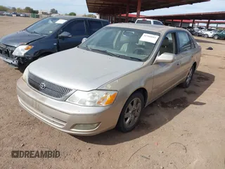 2002 Toyota Avalon XL with VIN 4T1BF28BX2U236851, listed as a IAAI auction lot 41566661 with 260,124 mi miles and . Bid and sale history available at DreamBid. Image 2.