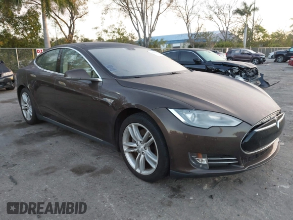 2014 Tesla Model S 60 z VIN 5YJSA1H19EFP51406, wystawiony jako IAAI lot #41561395 z przebiegiem Nie podano mil oraz . Historia ofert i sprzedaży dostępna na DreamBid. Obrazek 1.
