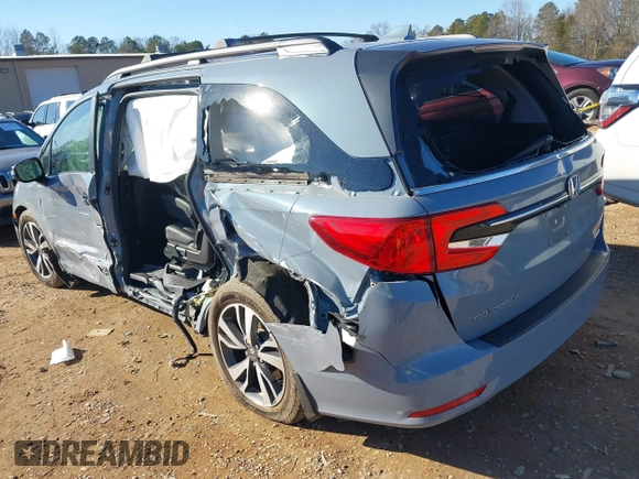 2023 Honda Odyssey Touring with VIN 5FNRL6H84PB005208, listed as a IAAI auction lot 41374452 with 60,288 mi miles and . Bid and sale history available at DreamBid. Image 3.