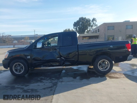 2004 Nissan Titan SE with VIN 1N6AA06A14N574940, listed as a IAAI auction lot 41821005 with 202,373 mi miles. Bid and sale history available at carsss.com. Image 14.