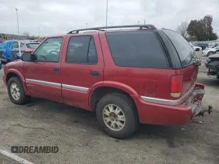 1999 GMC Jimmy SLE with VIN 1GKDT13W3X2546163, listed as a Copart auction lot 79842734 with 144,800 mi miles and Salvage Title. Bid and sale history available at carsss.com. Image 2.