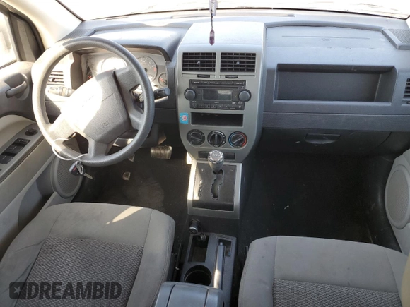 2007 Jeep Compass Sport with VIN 1J8FT47047D418703, listed as a Copart auction lot 77315704 with 159,932 mi miles and Salvage Title. Bid and sale history available at carsss.com. Image 8.
