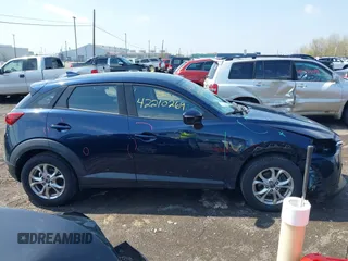 2019 Mazda CX-3 Sport z VIN JM1DKFB71K0445584, wystawiony jako IAAI lot #42210269 z przebiegiem 31 418 mil mil oraz . Historia ofert i sprzedaży dostępna na DreamBid. Obrazek 13.