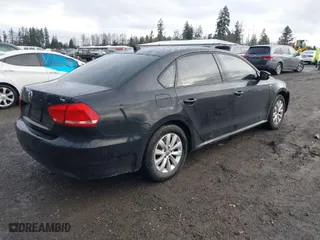 2014 Volkswagen Passat Wolfsburg Ed with VIN 1VWAT7A35EC093520, listed as a IAAI auction lot 41594539 with 139,779 mi miles. Bid and sale history available at carsss.com. Image 4.