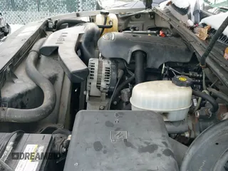 2004 Chevrolet Suburban LS z VIN 1GNFK16Z44J282618, wystawiony jako IAAI lot #41395390 z przebiegiem 125 922 mil mil oraz . Historia ofert i sprzedaży dostępna na DreamBid. Obrazek 12.