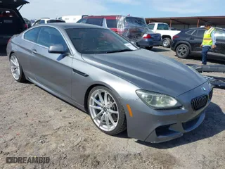 2012 BMW 6 Series 650i with VIN WBALX3C5XCC528484, listed as a IAAI auction lot 42080063 with 120,995 mi miles. Bid and sale history available at carsss.com. Image 1.