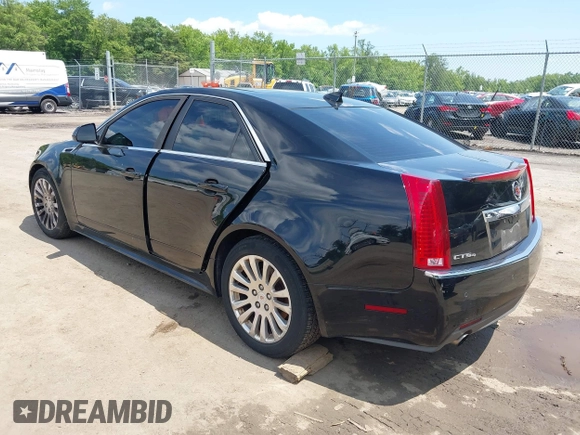 2011 Cadillac CTS Premium with VIN 1G6DS5ED4B0105859, listed as a IAAI auction lot 42494741 with 143,128 mi miles and . Bid and sale history available at DreamBid. Image 3.