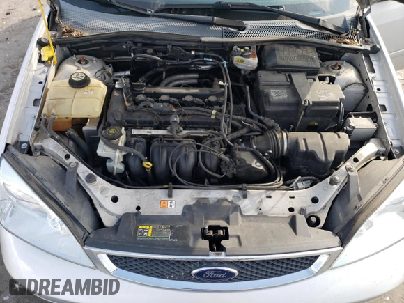 2007 Ford Focus S with VIN 1FAHP37N67W268162, listed as a Copart auction lot 71736384 with 69,391 mi miles and Salvage Title. Bid and sale history available at DreamBid. Image 11.